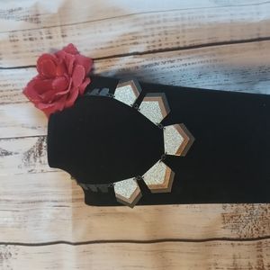 art deco style necklace with black chain.